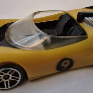 Speedy Yellow Toy Car with Number 9